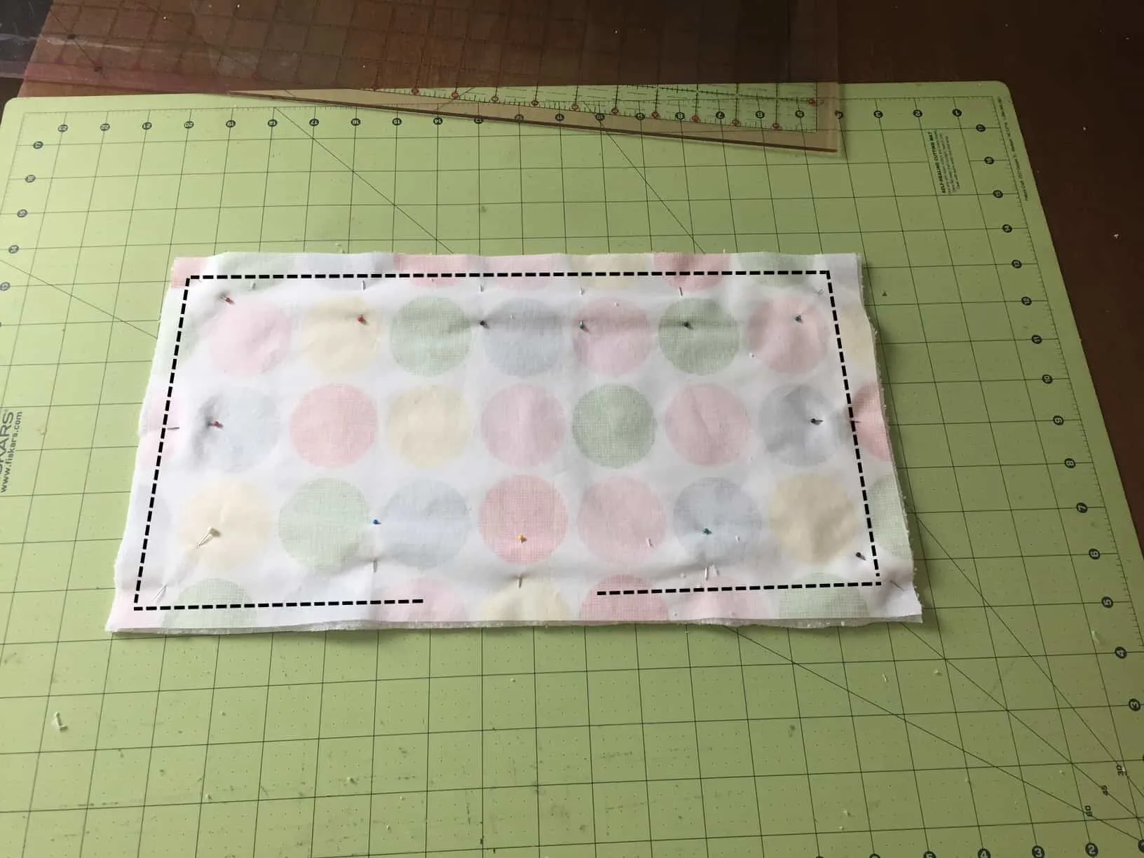 diy burp cloth tutorial- lines showing where to sew around the edges
