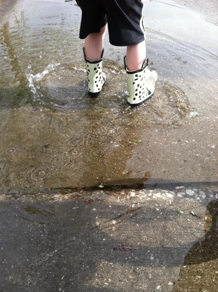 my son splashing in puddles