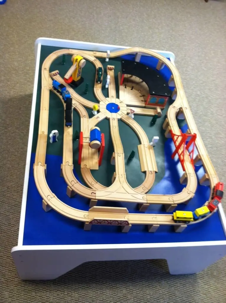 the completed train table makeover with the train set on top