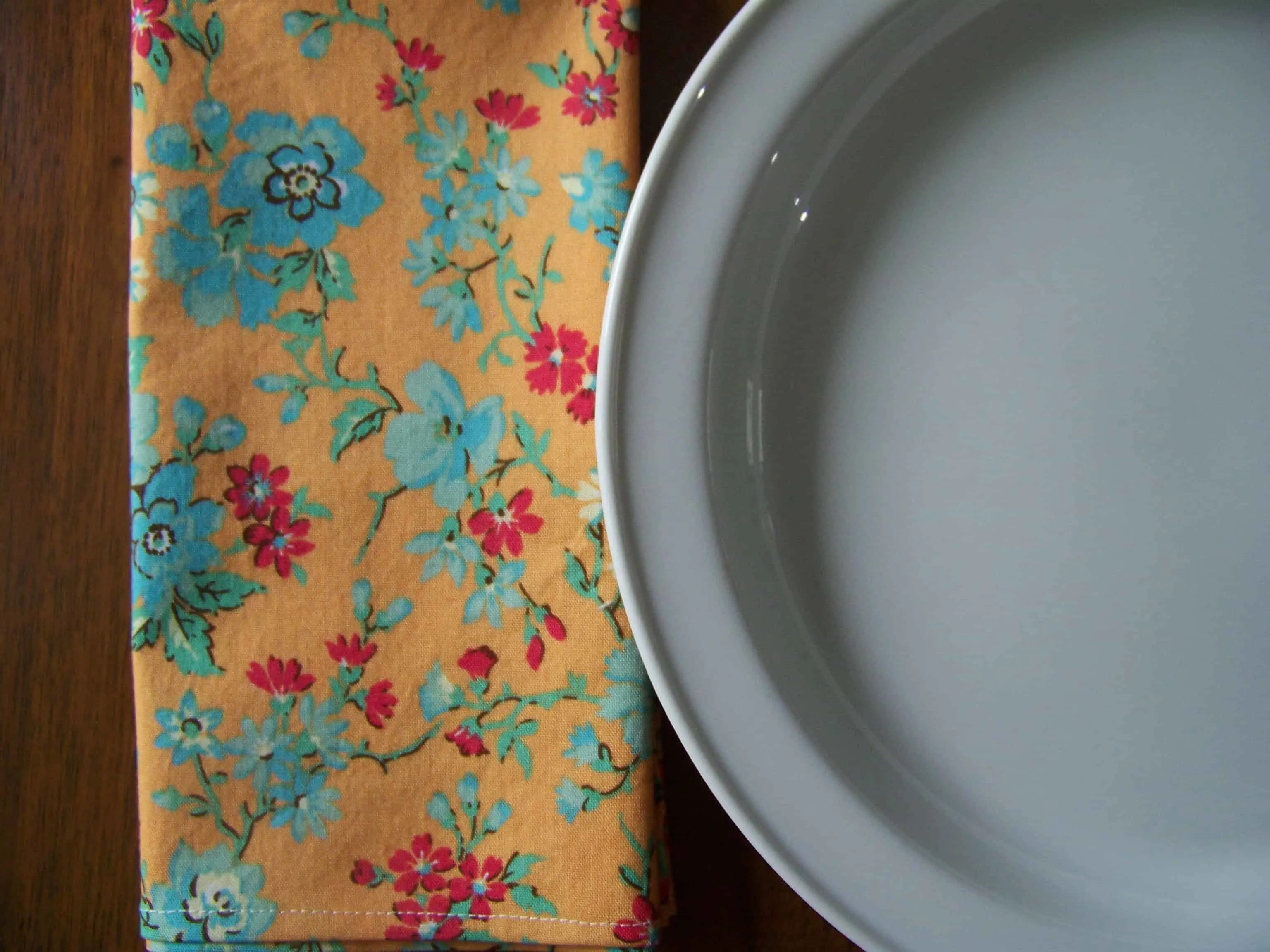the cloth napkin next to a plate