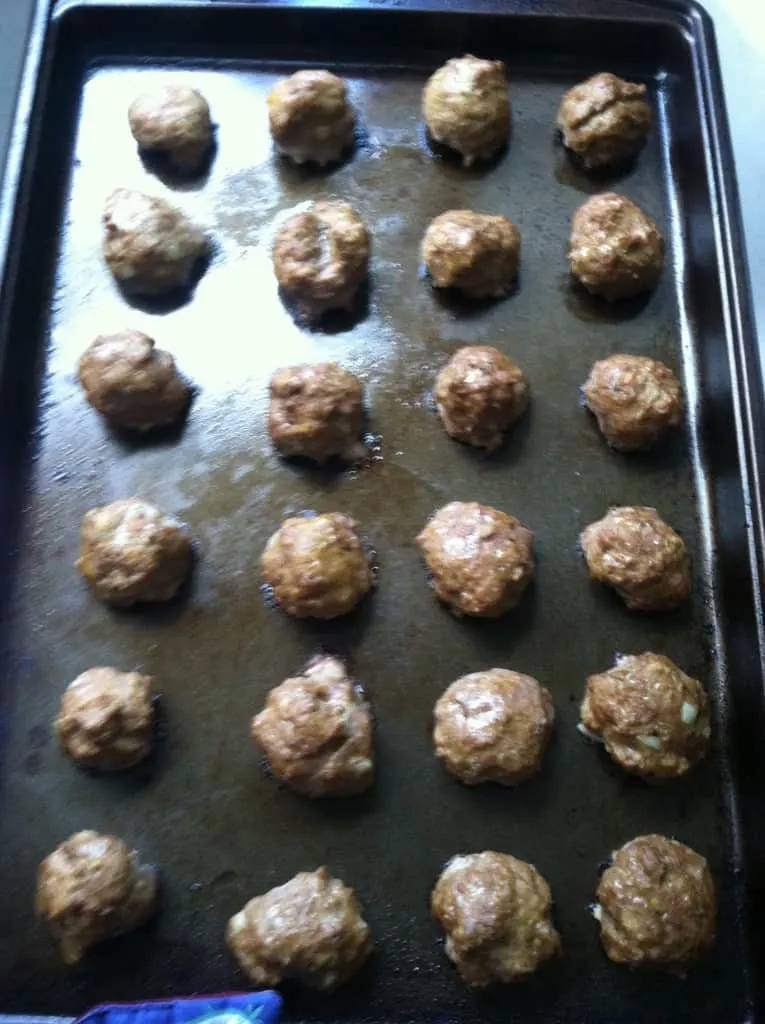 the meatballs after rolling and baking