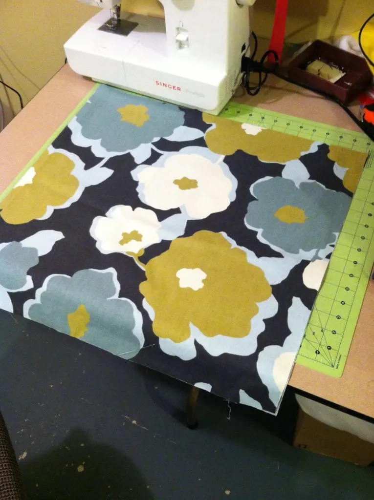 floral fabric on a cutting mat