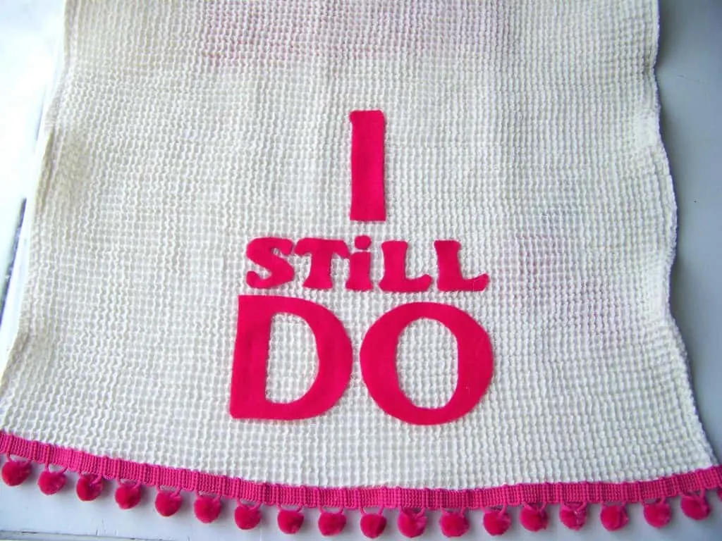 felt letters on top of dish towel