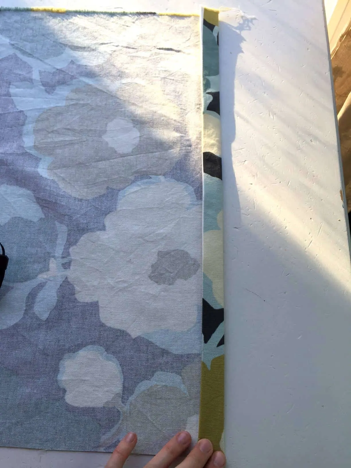 ironing over the folded ends