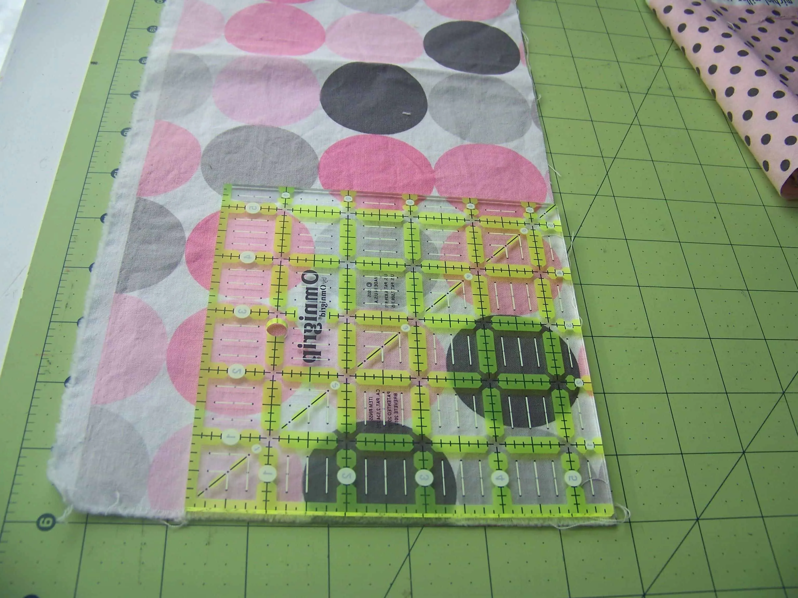 cutting out fabric for baby burp cloth