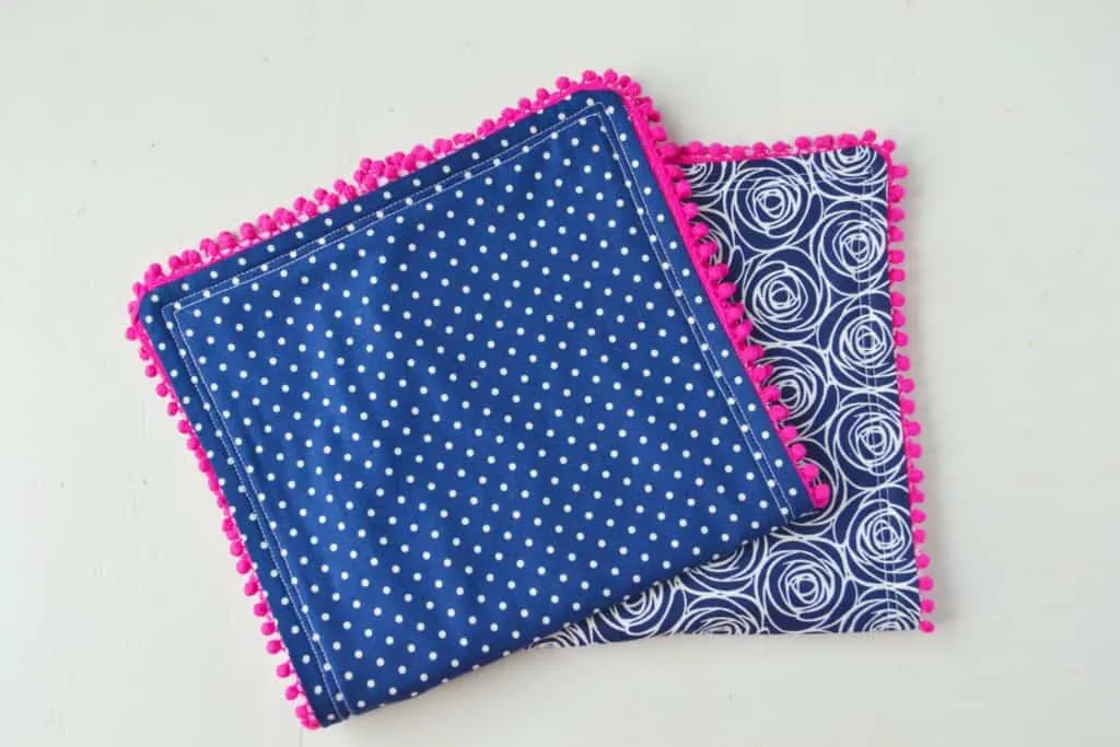 the burp cloths folded in half