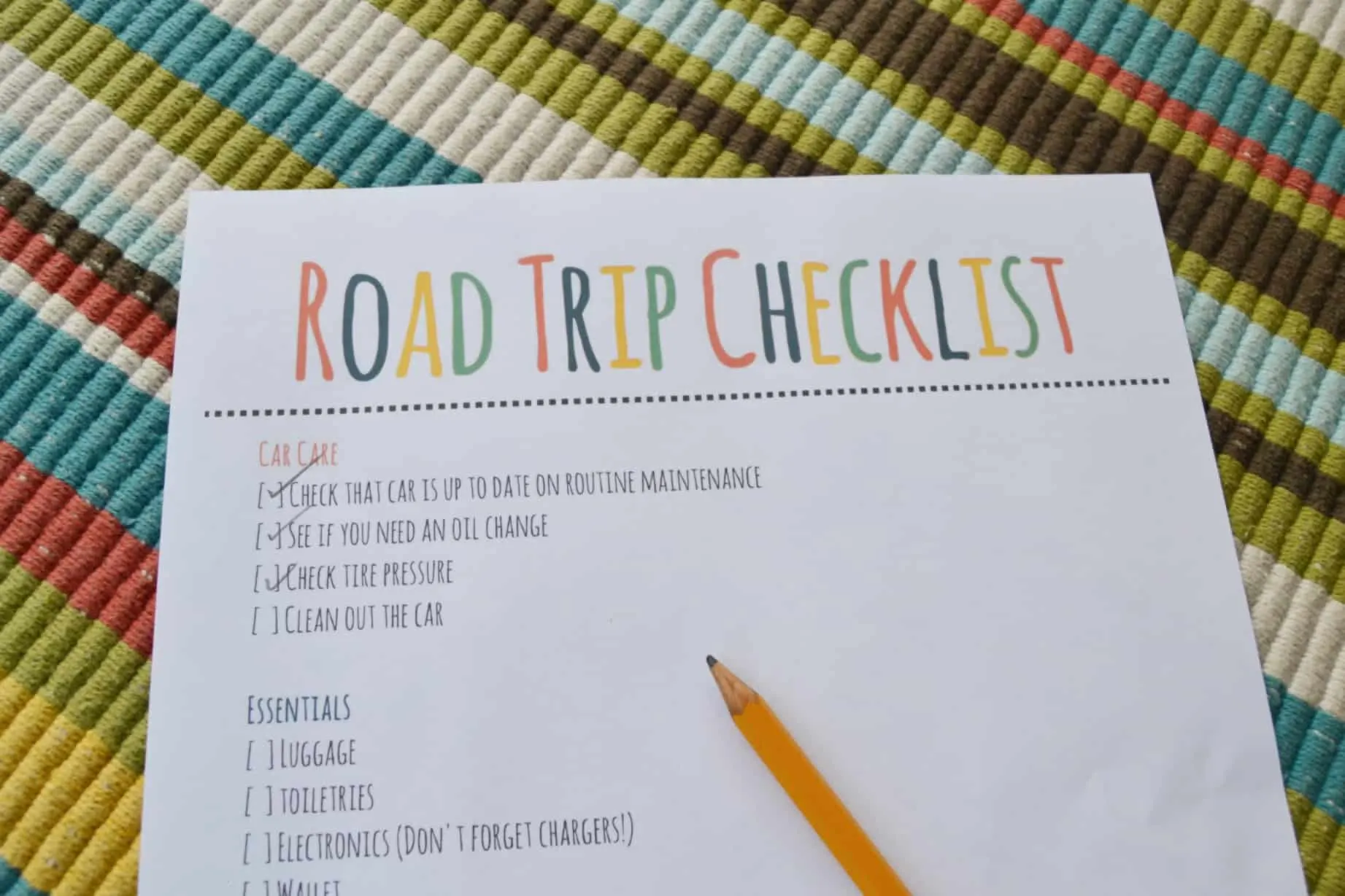 road trip checklist with pencil