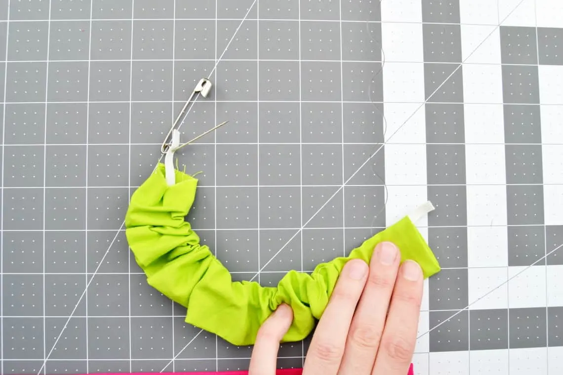 the elastic pulled through the tube