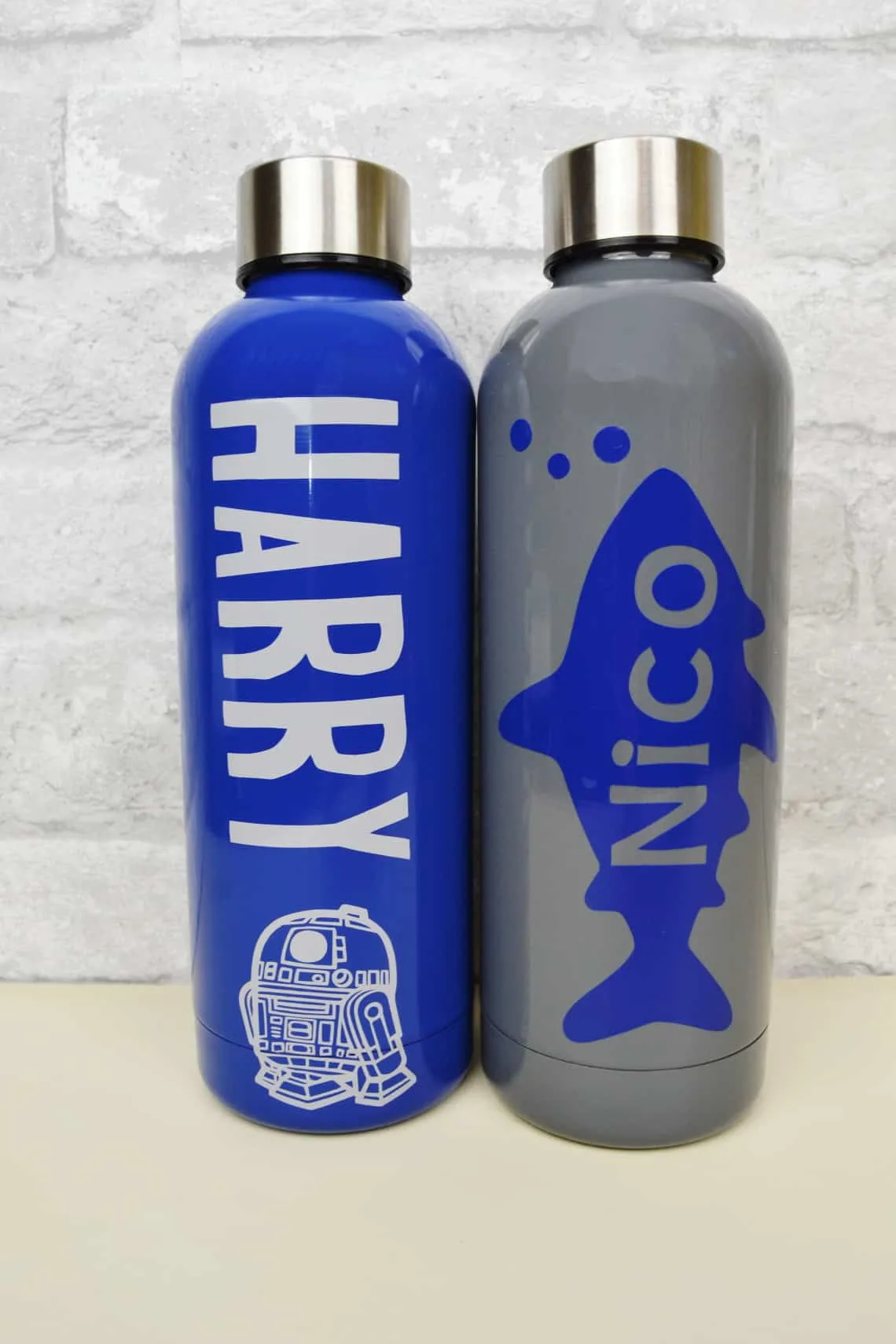 water bottles personalized with a Cricut Maker and vinyl