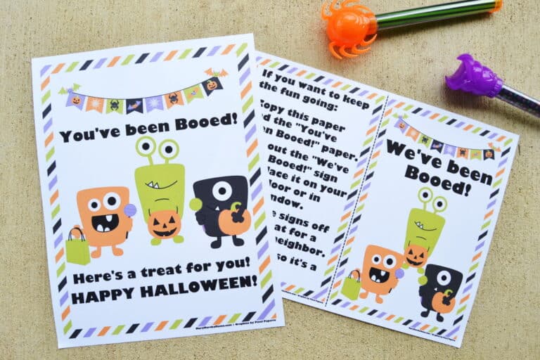 free printable you've been booed pdf papers printed out and sitting on concrete