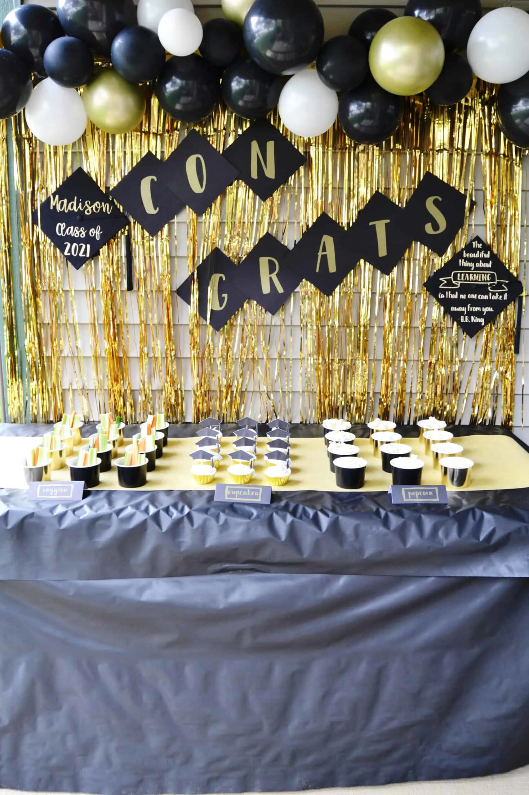DIY Graduation Party Decorations made with the Cricut Joy including decorated graduation caps