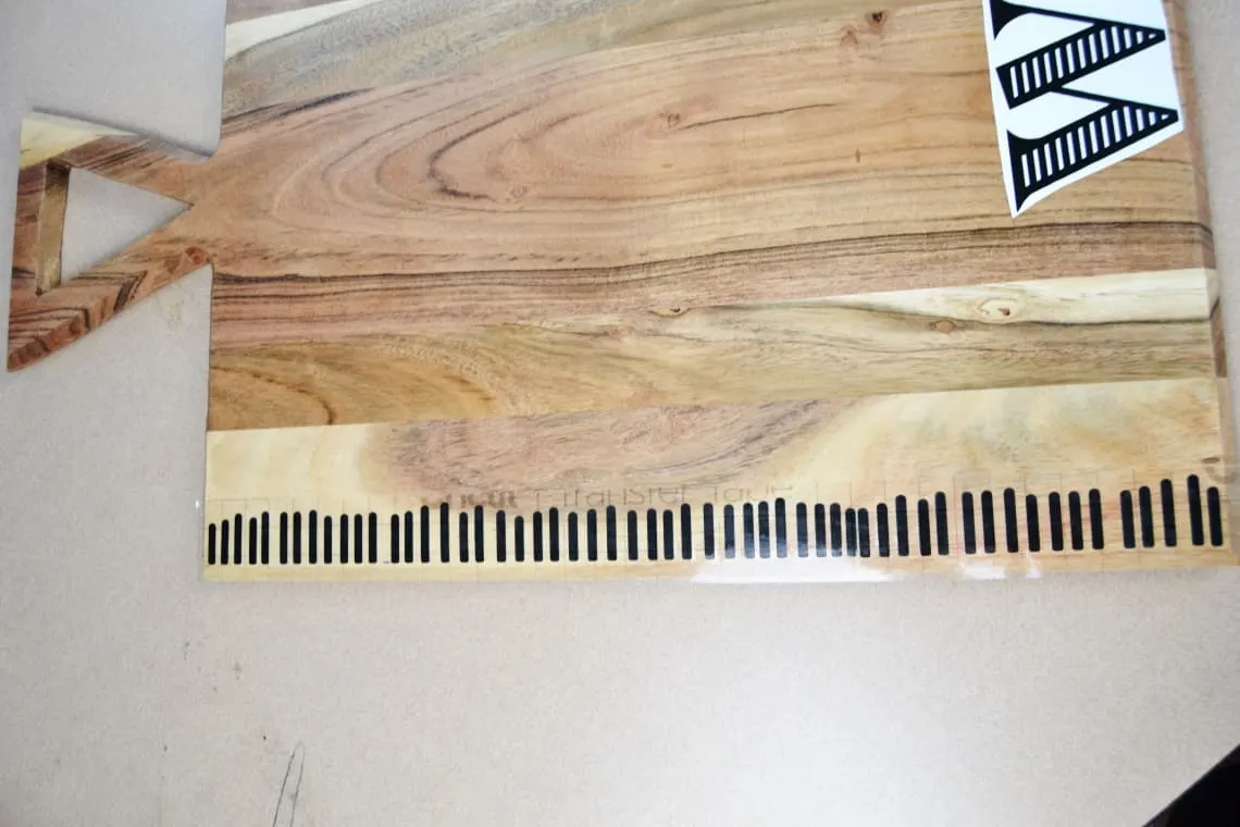 transferring the vinyl to the charcuterie board