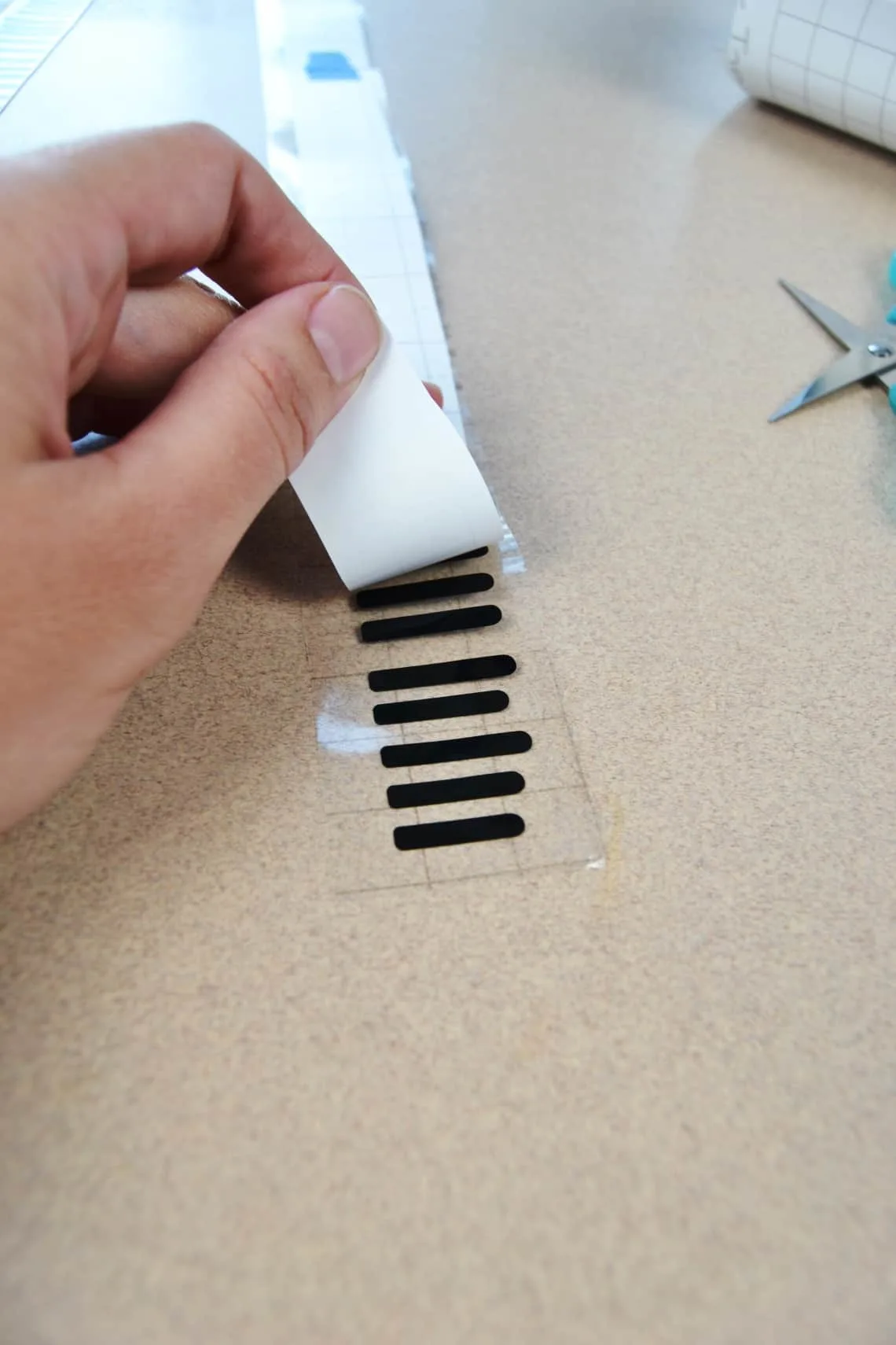attaching the vinyl to the transfer tape