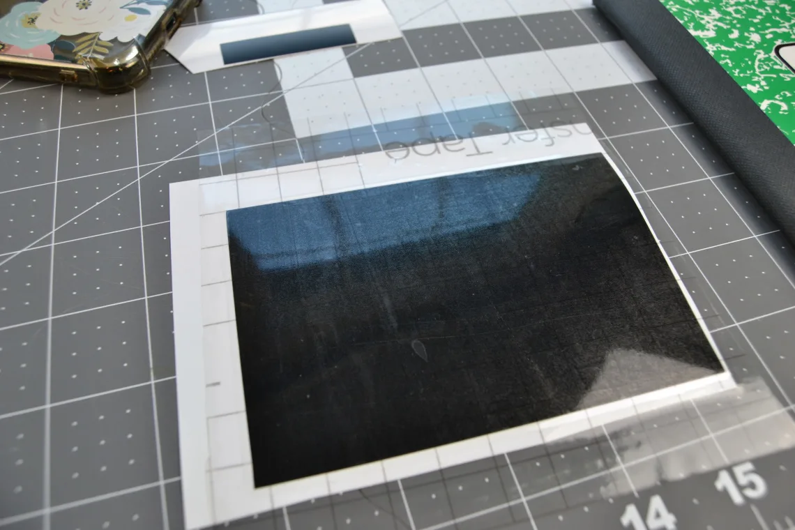 the transfer tape on top of the vinyl