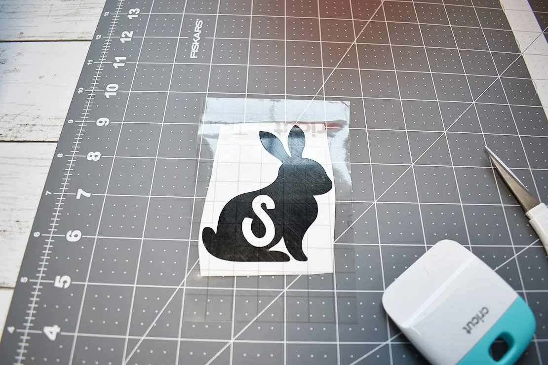 applying the transfer tape to the vinyl