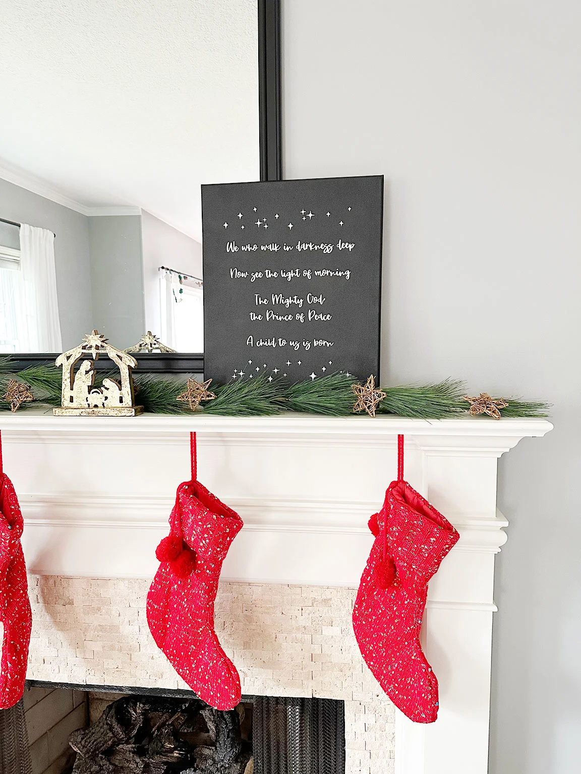 DIY Christmas wall art on the mantle
