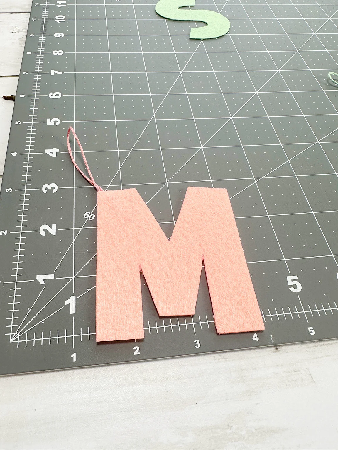 placing the top piece of felt on to the stack