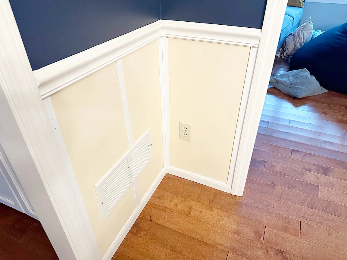 lattice pieces nailed to dining room wall