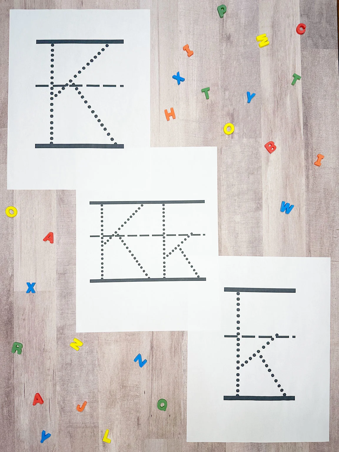 letter k tracing sheets on a table