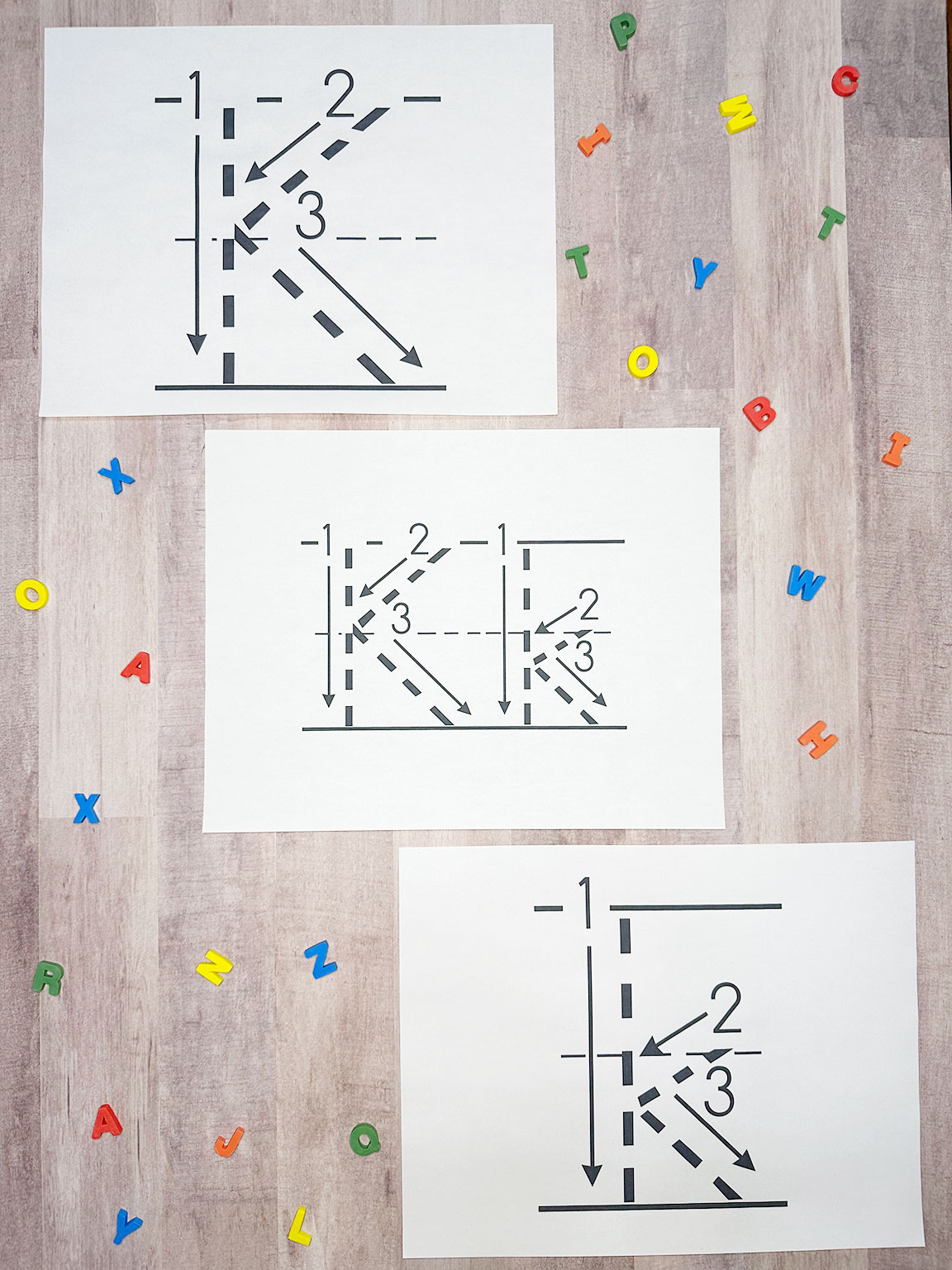 letter k printable worksheets on a wooden table
