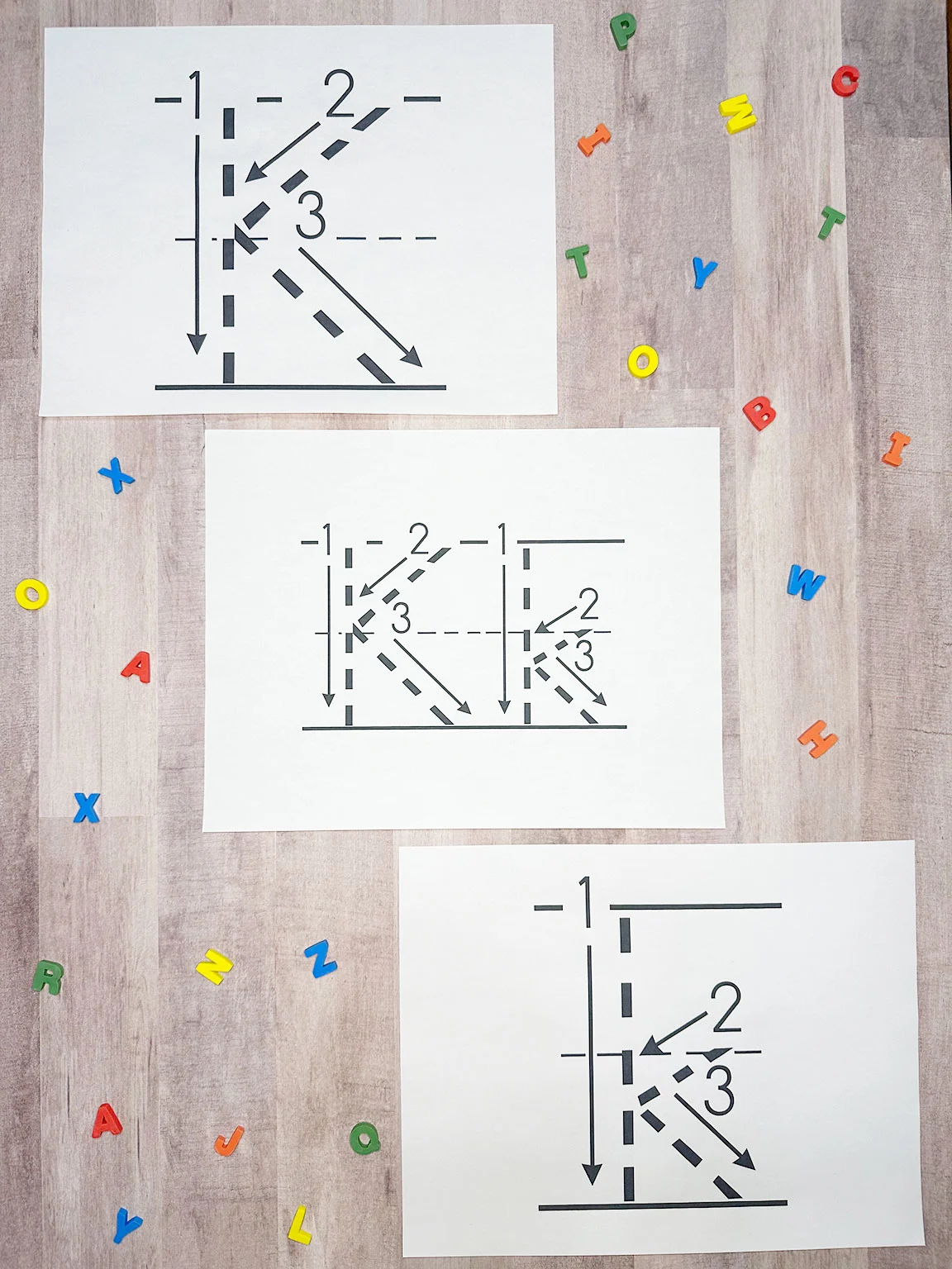 letter k printable worksheets on a wooden table