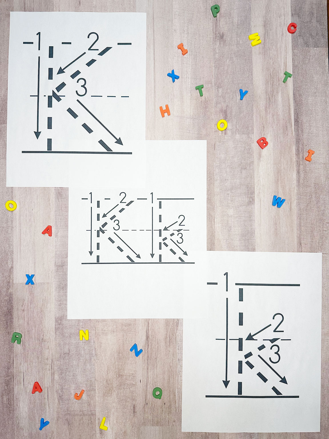 letter formation worksheets on a table