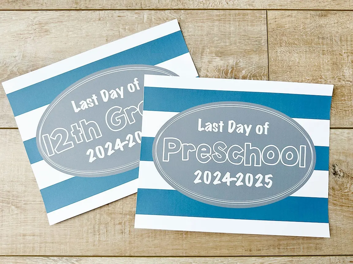 last day of school signs 2025 sitting on table