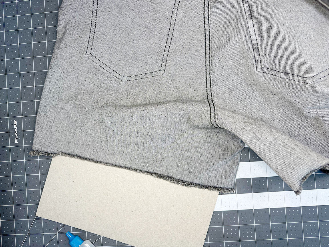 the fray check drying on the jeans