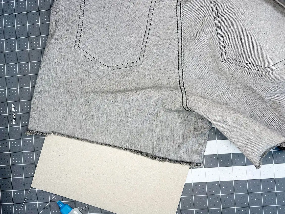 the fray check drying on the jeans