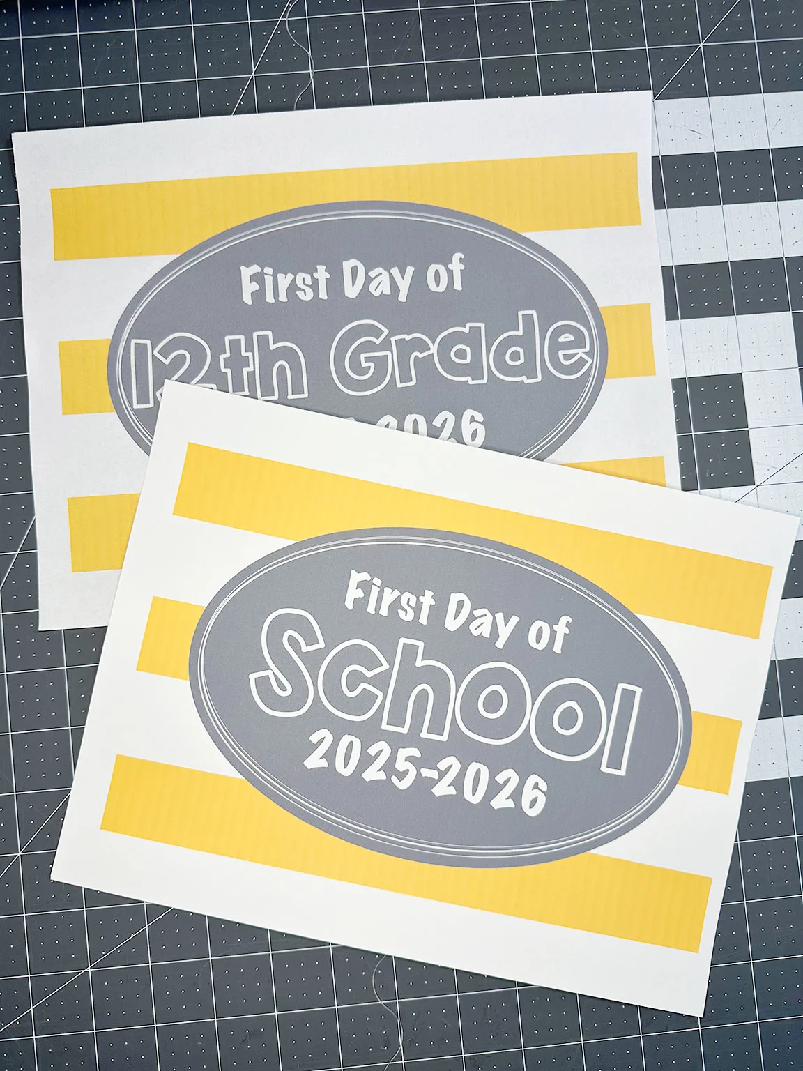 first day of school signs sitting on a cutting mat