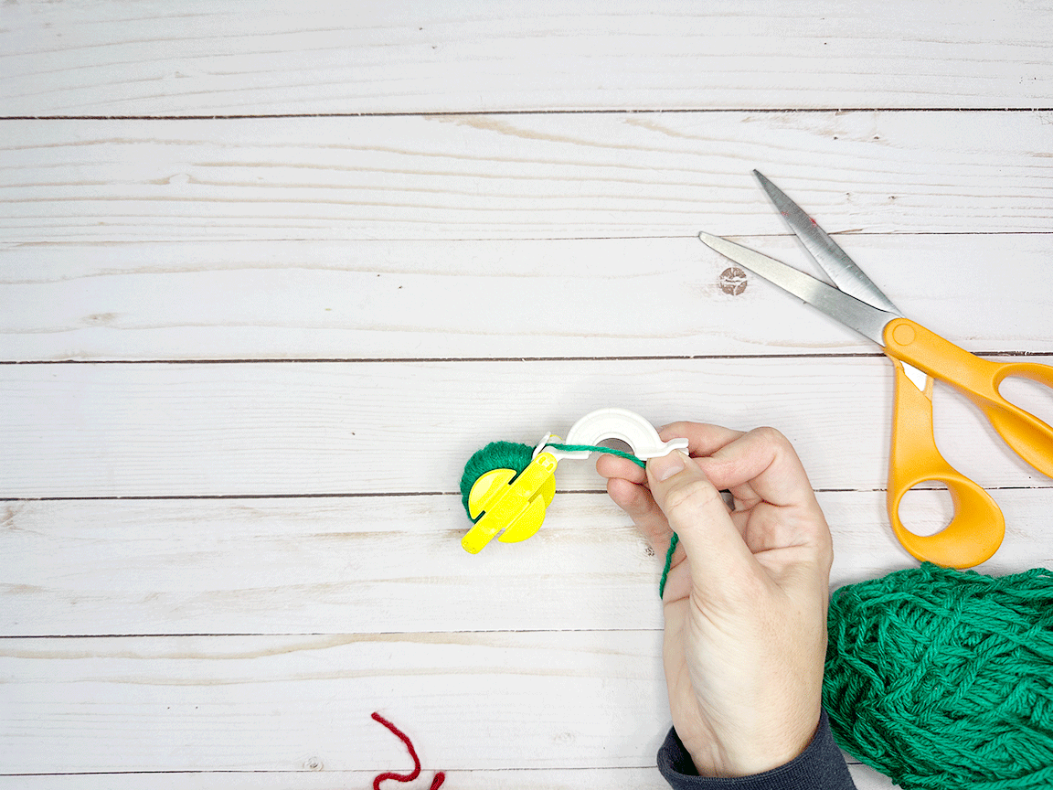 The Pom Pom maker with the first side wrapped
