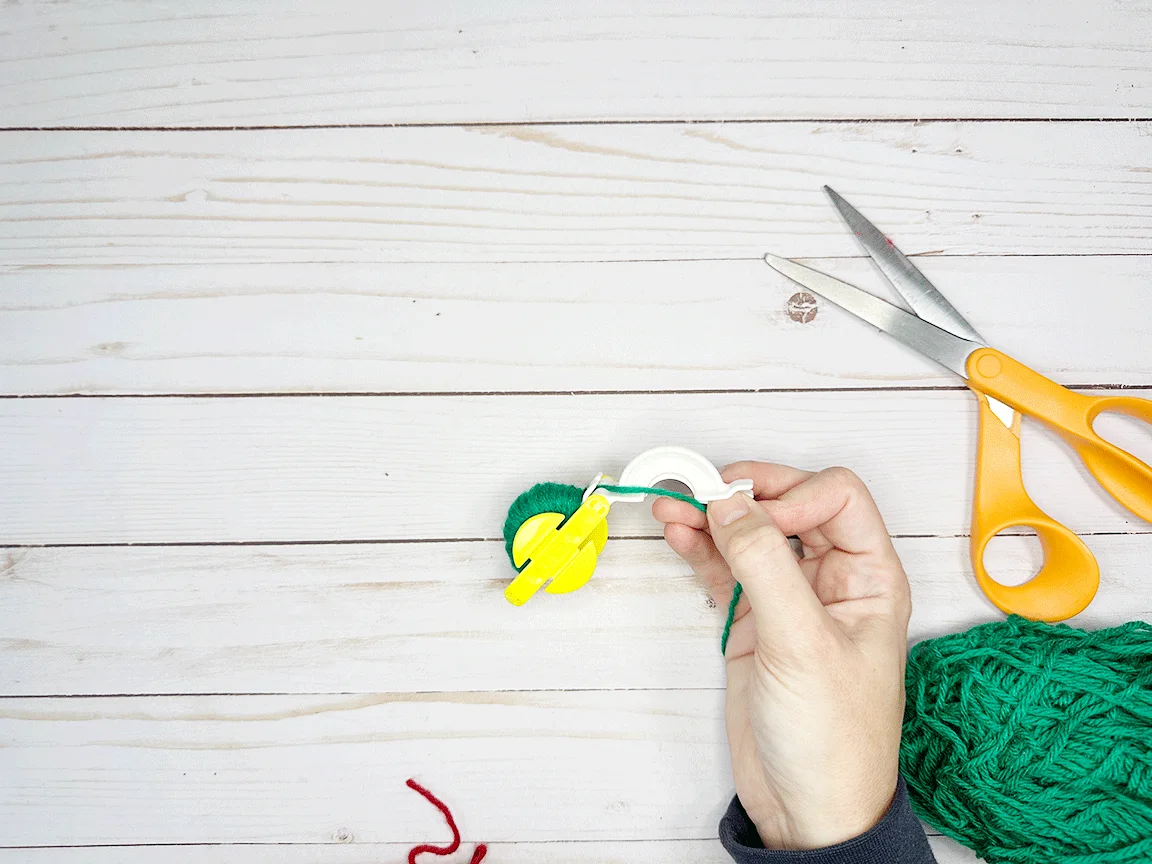 The Pom Pom maker with the first side wrapped