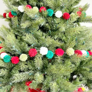 DIY Pom Pom Garland on a Christmas tree