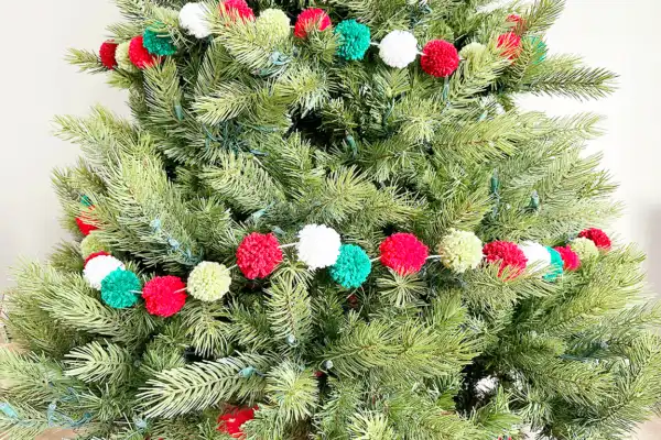 DIY Pom Pom Garland on a Christmas tree