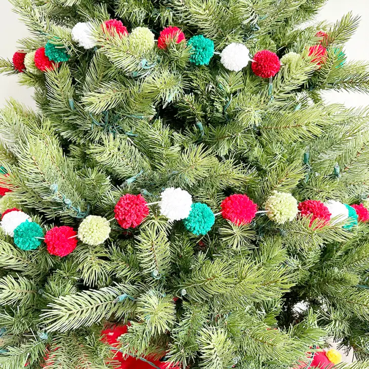 DIY Pom Pom Garland on a Christmas tree