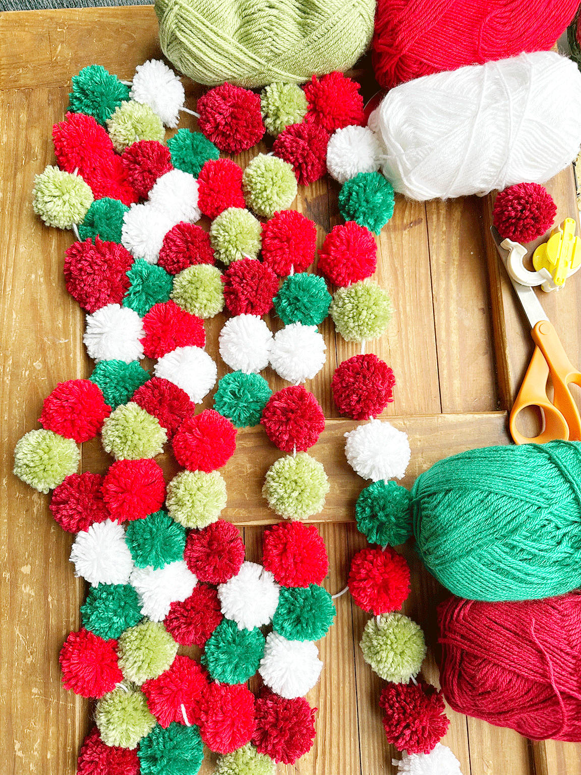 Pom Poms strung onto a garland