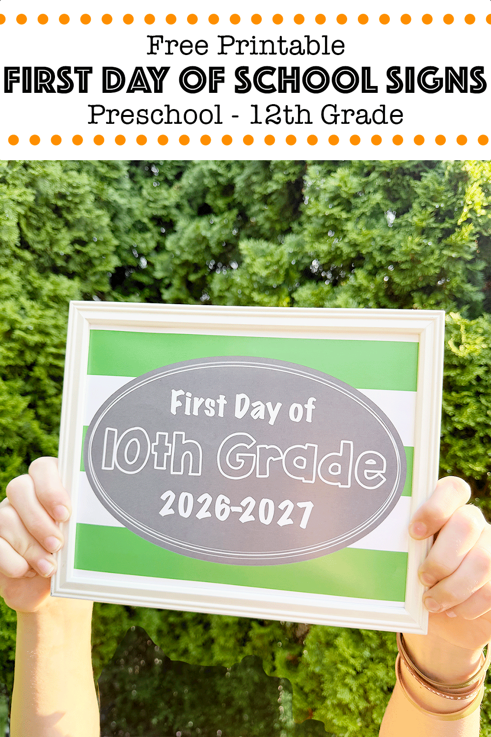 Free printable first day of school signs 2026 sign being held in front of bushes