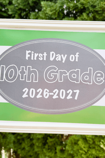 first day of school signs 2026 first day of 10th grade sign being held up