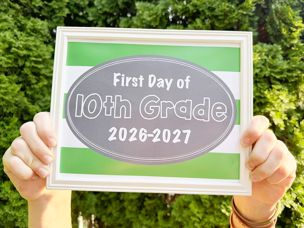 first day of school signs 2026 first day of 10th grade sign being held up